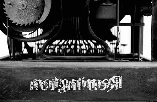 black-and-white greyscale photography of Remington table machine pioneertown